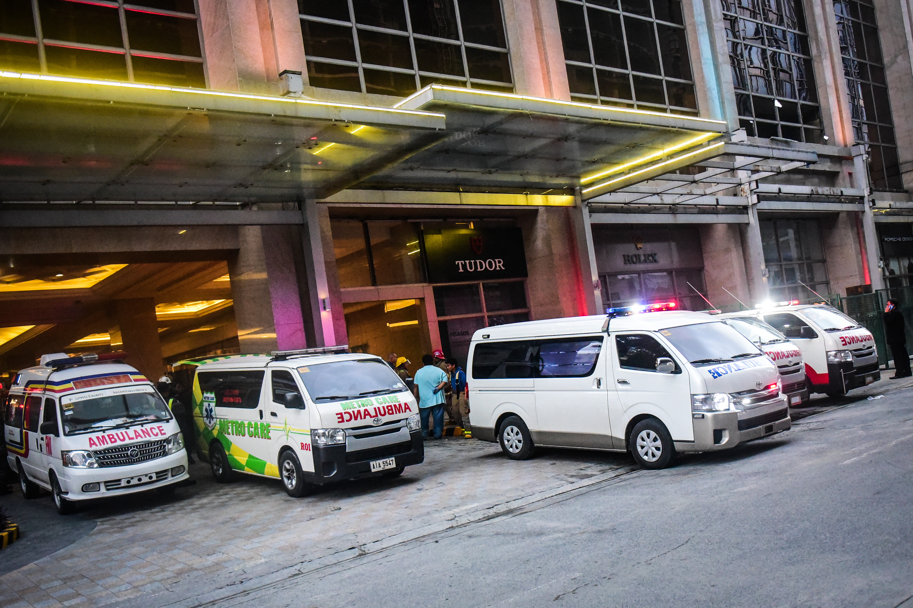 EMERGENCY. A row of ambulances is seen outside Resorts World Manila as bodies are recovered from the hotel casino on June 2, 2017. Photo by Alecs Ongcal/Rappler 