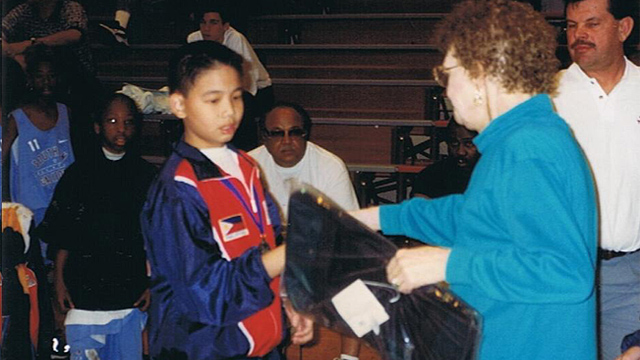 A younger Chris receives the MVP award during a grade school varsity tournament in Las Vegas, where his team won against US teams. Photo courtesy of Chris Tiu  