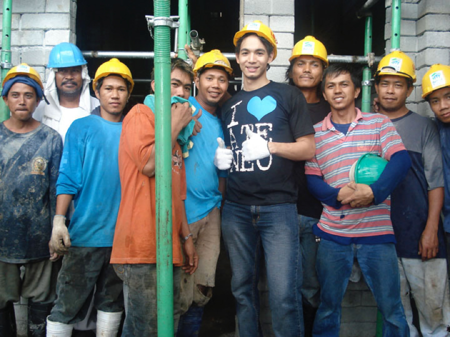 Chris at a Habitat for Humanity site. Photo from One Mega Group/Courtesy of Chris Tiu 