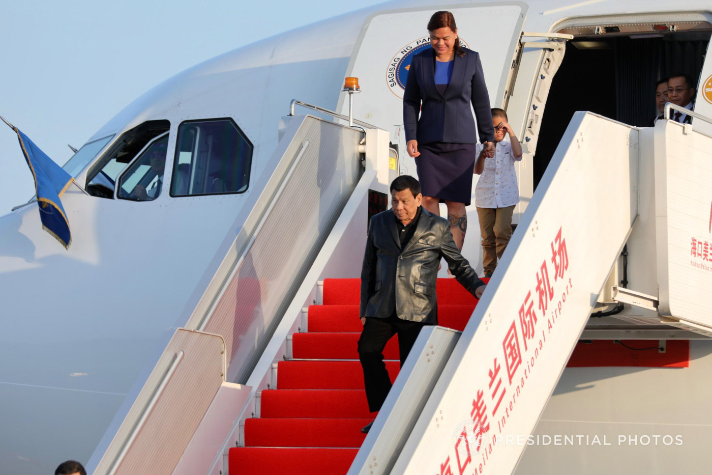 CHARTERED FLIGHT. President Rodrigo Duterte disembarks from a Philippine Airlines chartered flight upon his arrival at the Qionghai Bo'ao International Airport in Hainan, China on April 9, 2018. Malacañang file photo 