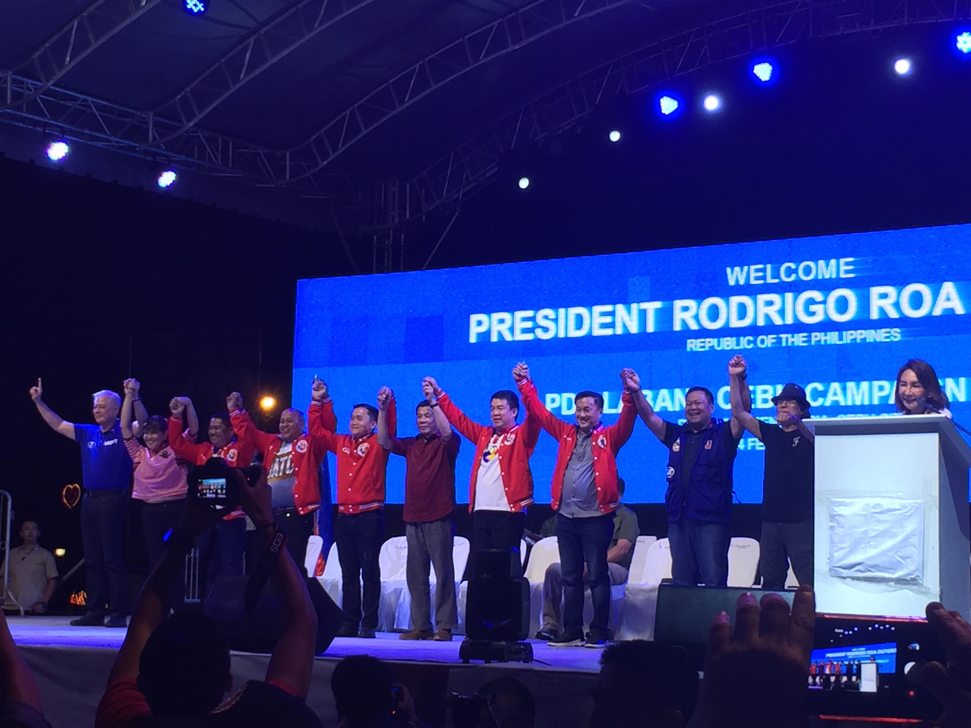 FAVOR. President Rodrigo (middle), at the PDP-Laban rally in Cebu City on February 24, 2019, endorses the gubernatorial bid of Gwen Garcia (rightmost) because her family helped his presidential campaign at the last minute in 2016. Photo by Micole Gerard Tizon/Rappler 