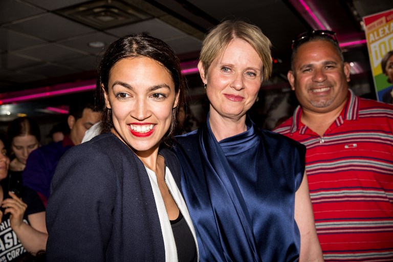 VICTORY PARTY. Progressive challenger Alexandria Ocasio-Cortez is joined by New York gubenatorial candidate Cynthia Nixon at her victory party in the Bronx after upsetting incumbent Democratic Representative Joseph Crowley on June 26, 2018 in New York City. Photo by Scott Heins/Getty Images/AFP  
