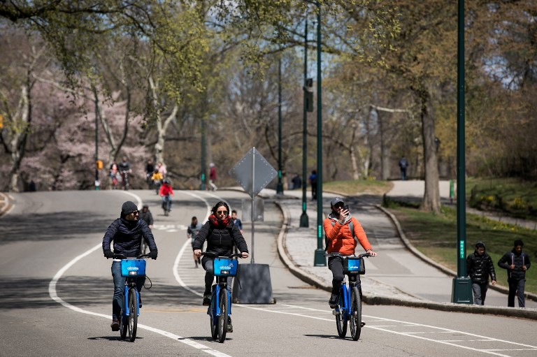 GREEN SPACE. People ride bicycles on West Drive in the southern portion of Central Park, April 20, 2018 in New York City. File photo by Drew Angerer/Getty Images/AFP 
