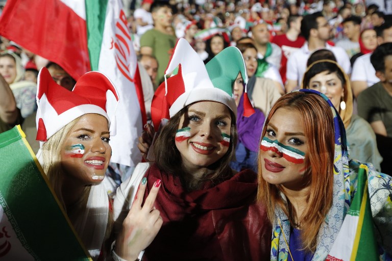 OPEN DOORS. It is another step forward to gender equality as Iranian women were finally allowed to watch Iran's match against Portugal at Azadi stadium in Tehran. Photo by Atta Kenare/AFP 