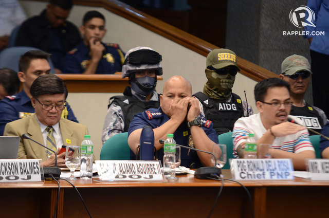 PNP CHIEF. Director General Ronald dela Rosa (center, in blue) during the Senate probe into the death of the late Albuera Mayor Rolando Espinosa Sr. Photo by LeAnne Jazul/Rappler 