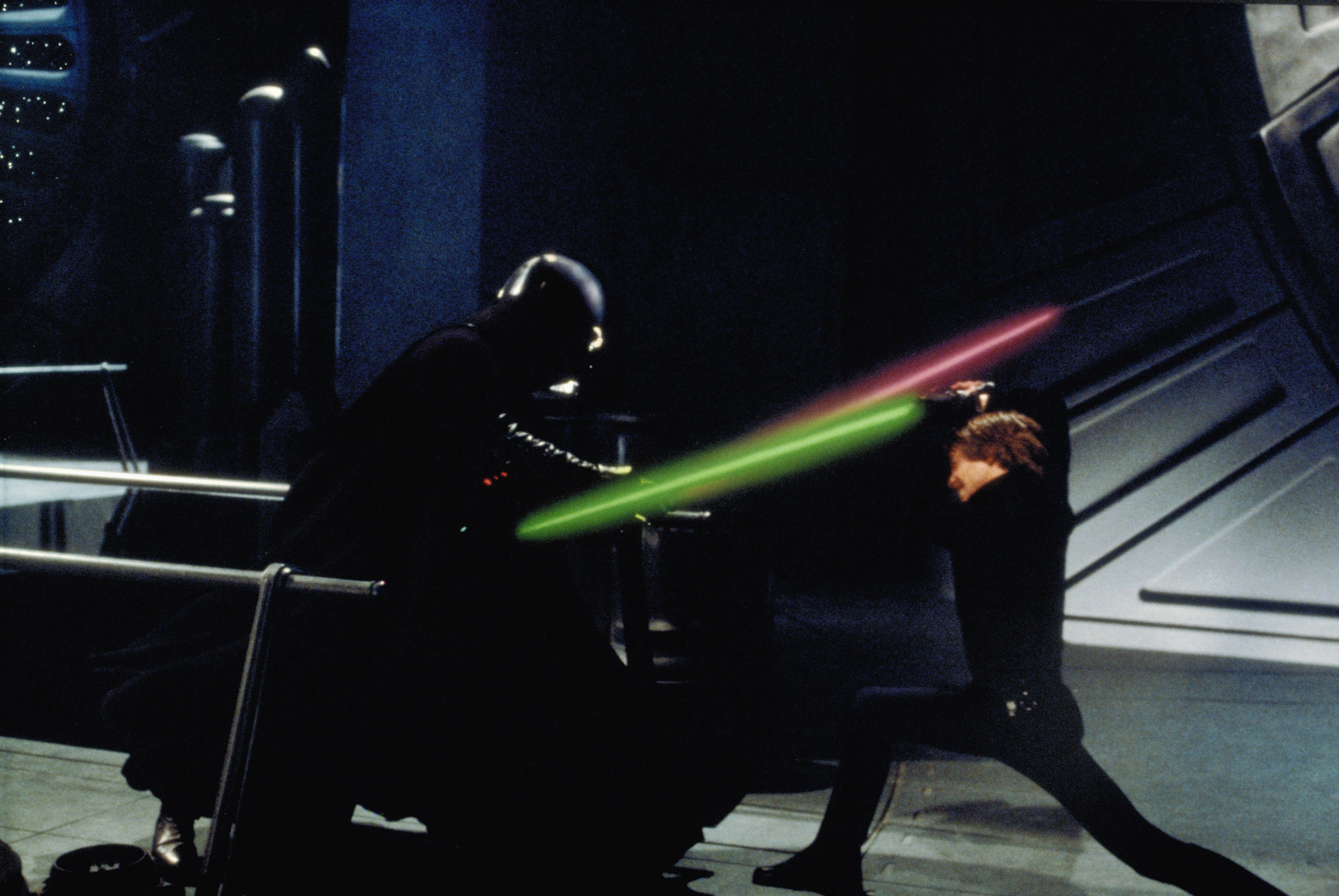 THE BATTLE. Still shows Dark Vader and Luke Skywalker's lightsaber battle in 'Return of the Jedi.'    