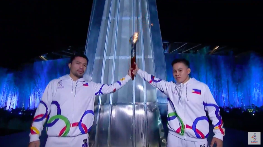 STAR-STUDDED. Boxing champions Manny Pacquiao and Nesthy Petecio serve as torchbearers. Screenshot from 2019 South East Asian Games Philippines/Youtube  