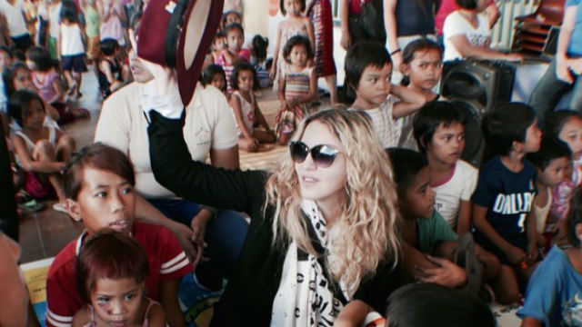 BAHAY TULUYAN. Madonna surprises the children at Bahay Tuluyan, a shelter for orphans and street children. Screengrab from Instagram/madonna
  