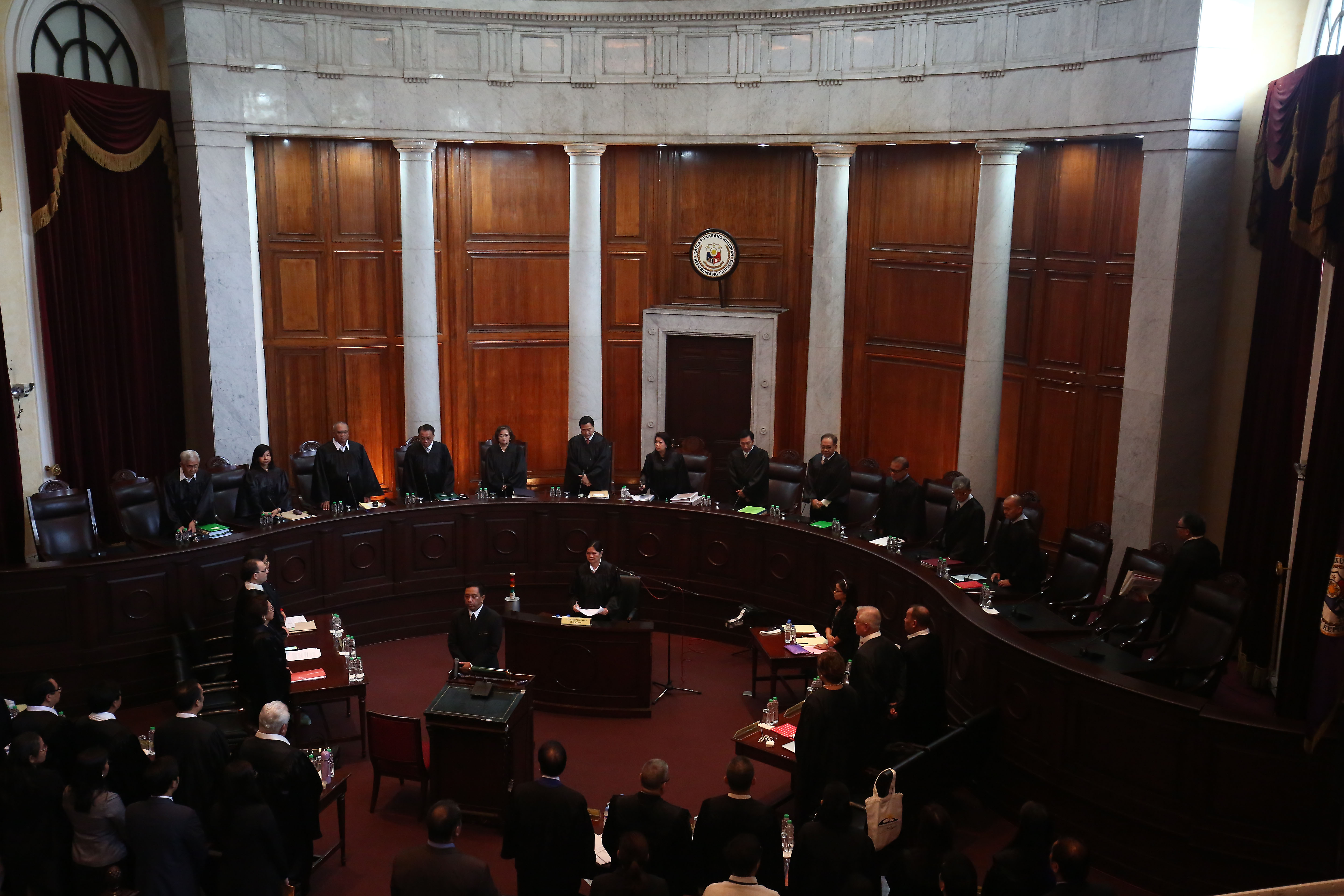 ORAL ARGUMENTS. Supreme Court justices enter as the oral arguments on the proposed burial of late dictator Ferdinand Marcos at the Libingan ng mga Bayani starts at the Supreme Court in Manila on August 31, 2016. Photo by Ben Nabong/Rappler 