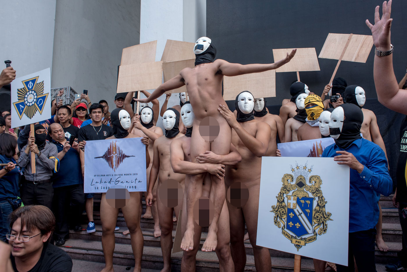 NAKED RUNNERS. Members of the Alpha Phi Omega fraternity participate in the 42nd Oblation Run at the University of the Philippines, Diliman on February 8, 2019. Photo by Lisa David/Rappler   