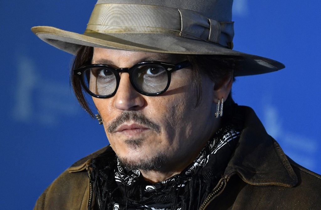 LIBEL CASE. Photo show actor Johnny Depp  during a photocall for the film 'Minamata' screened in the Berlinale Special Gala on February 21, 2020 at the 70th Berlinale film festival in Berlin.  The actor's lawyers plan to admit statements made by his ex-partner Vanessa Paradis in his libel case against The Sun newspaper. File photo by John Macdougall/AFP  