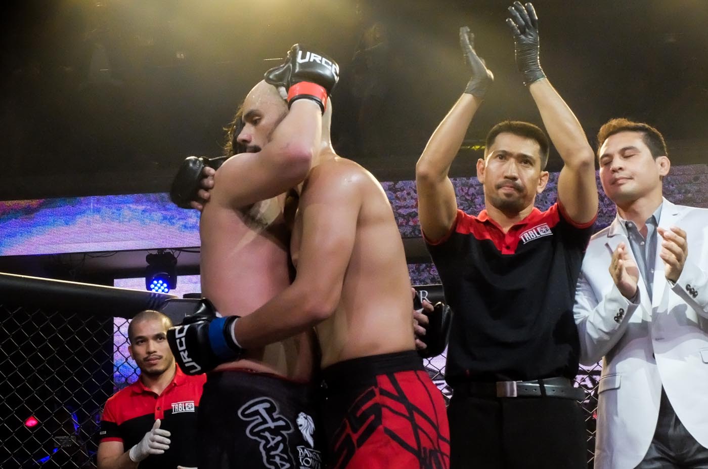 HUGGING IT OUT. Baron Geisler and Kiko Matos say they are now on good terms with each other, after fighting it out in an MMA cage. Photo by Alecs Ongcal/Rappler 