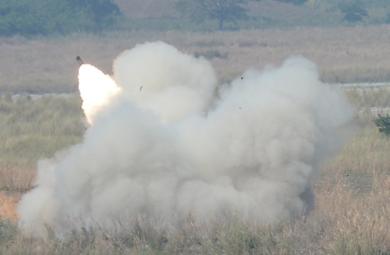 FIREPOWER. An M142 High Mobility Artillery Rocket System (HIMARS) of the US marines is fired during a live fire exercise as part of 'Balikatan' joint US-Philippine military exercise at Crow Valley, in Capas town, north of Manila on April 14, 2016. Ted Aljibe/AFP 
