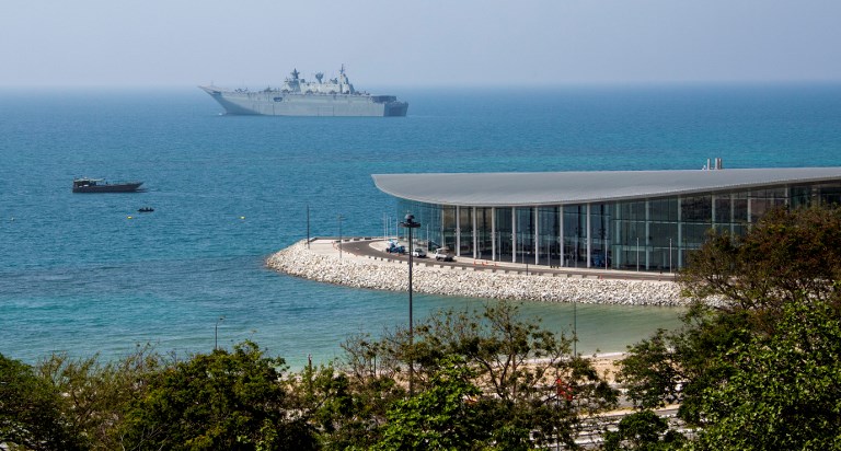 APEC PREPS. This photo taken on November 4, 2018 shows the Australian warship HMAS Adelaide moored off APEC Haus in Port Moresby ahead of the upcoming Asia-Pacific Economic Cooperation (APEC) summit from November 17. Photo by Ness Kerton/AFP 