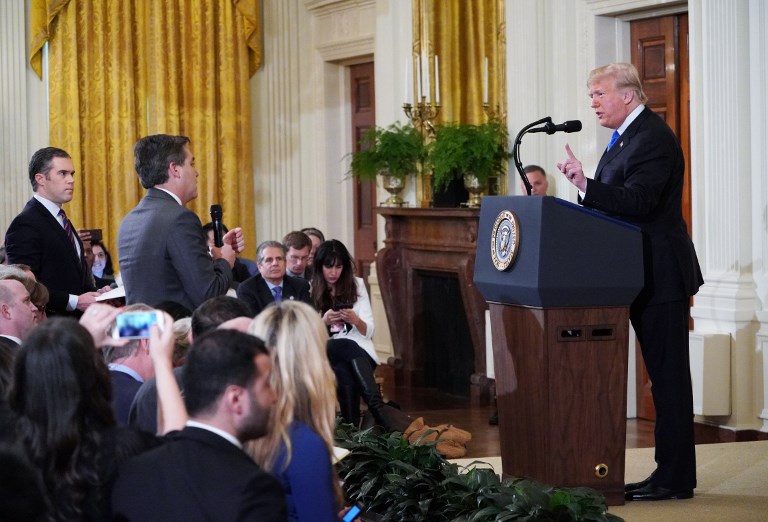 CONFRONTATON. File photo of the heated exchange between US President Donald Trump and CNN chief White House correspondent Jim Acosta. Photo by Mandel Ngan/AFP  