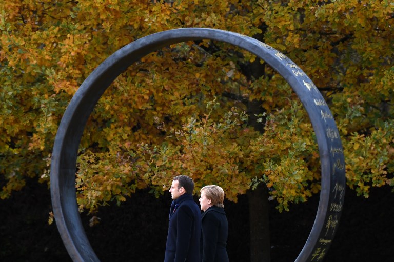 WALK IN THE PARK. French President Emmanuel Macron and German Chancellor Angela Merkel attend a French-German ceremony in the clearing of Rethondes (the Glade of the Armistice) in Compiegne, France, on November 10, 2018. Photo by Alain Jocard/AFP  