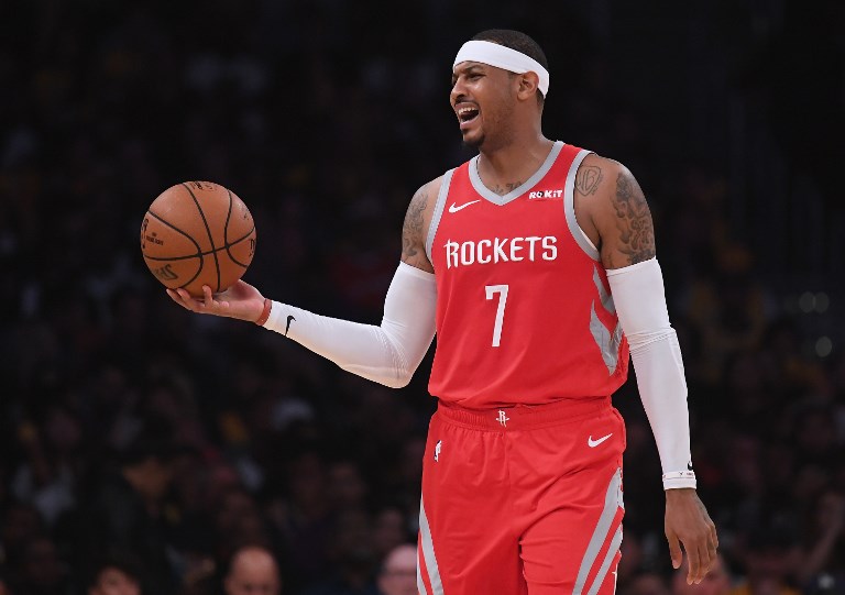 MOVING ON. Carmelo Anthony and the Houston Rockets are 'working toward a resolution.' Photo by Harry How/Getty Images/AFP    