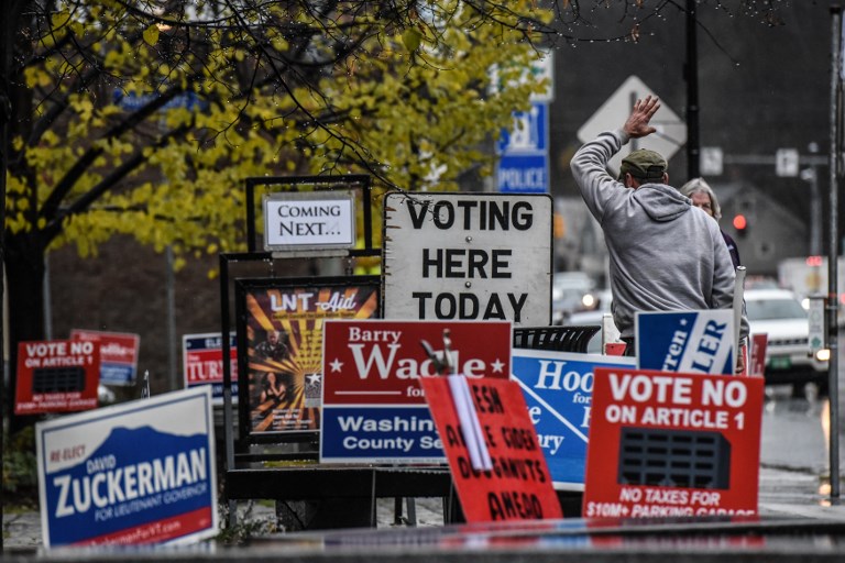 ELECTION DAY. Campaign signs for various candidates are seen outside the Montpelier Town Hall on November 6, 2018 in Montpelier, Vermont. Photo by Stephanie Keith/Getty Images/AFP 