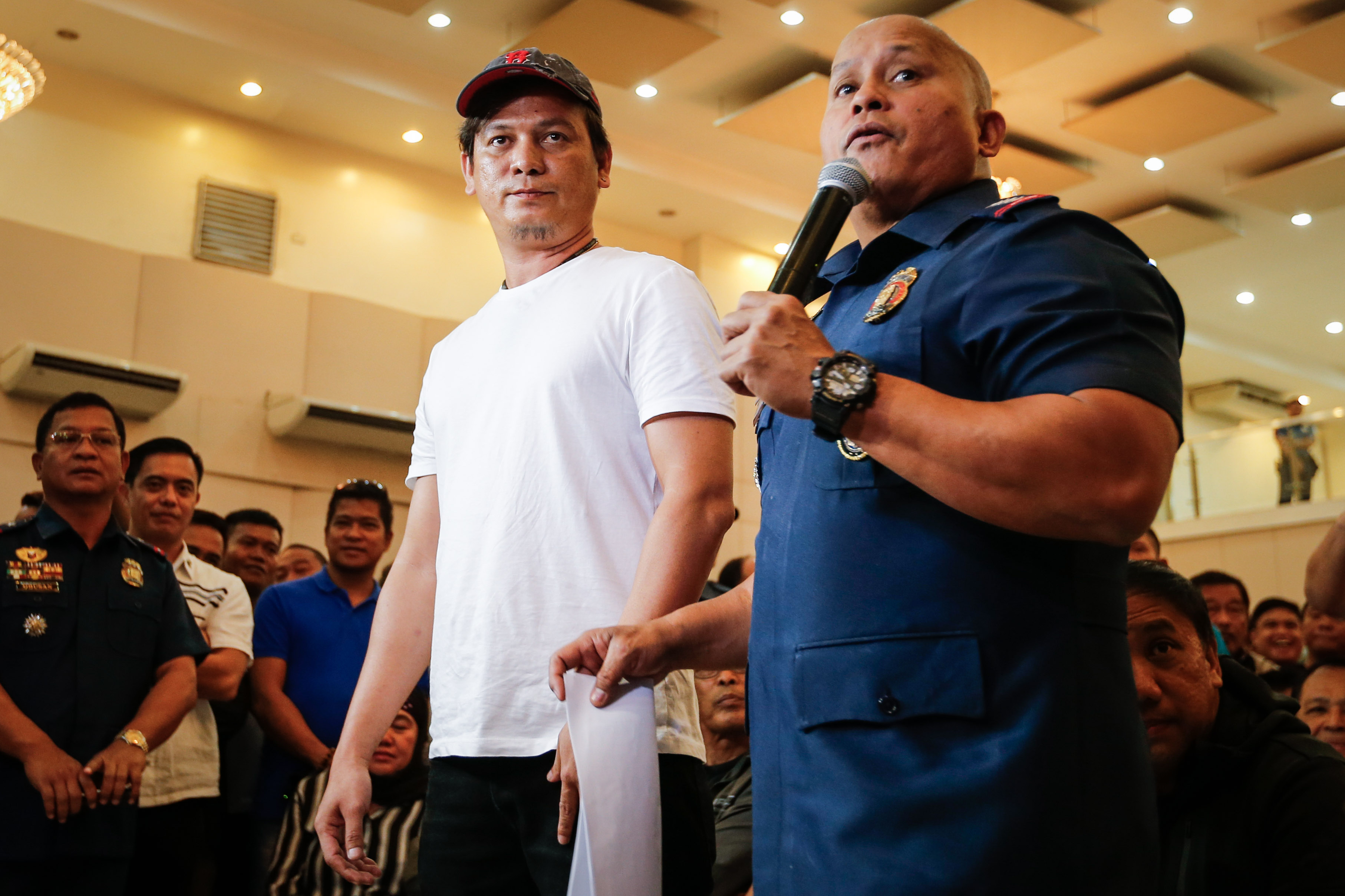 HVTs. PNP chief Ronald dela Rosa with Franz Sabalones, allegedly a top drug lord from Cebu. File photo by Mark Cristino/EPA   