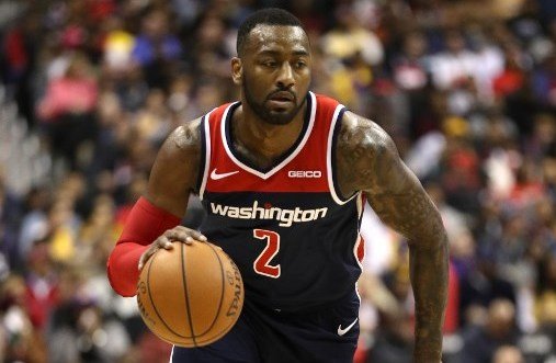 FREAK ACCIDENT. John Wall gets sidelined for a year after slipping in his home. Photo by Patrick Smith/Getty Images/AFP 