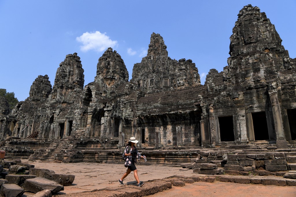 TOURISM. A tourist visits Bayon temple in Siem Reap, Cambodia, on March 5, 2020. Photo by Tang Chhin Sothy/AFP 