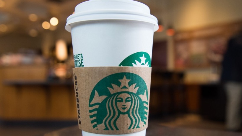 TAKE-OUT ONLY. Starbucks stores in the US won't allow customers to use personal tumblers and 'for here' cups temporarily over health concerns. Photo by Saul Loeb/AFP 