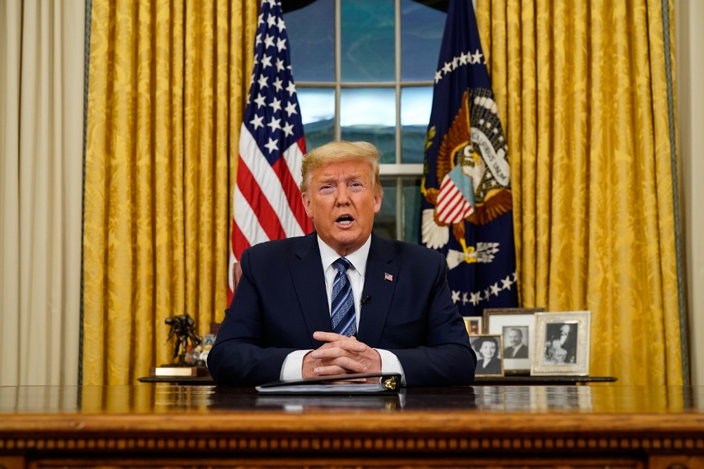 TRUMP. US President Donald Trump addresses the nation from the Oval Office about the widening Coronavirus crisis on March 11, 2020 in Washington, DC. File photo by Doug Mills-Pool/Getty Images/AFP 