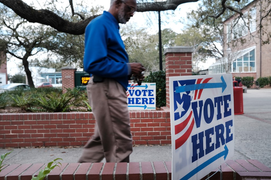 SUPER TUESDAY INCOMING. People walk past a polling station as the state votes in the primary election on February 29, 2020 in Charleston, South Carolina, United States. File photo by Spencer Platt/Getty Images/AFP 