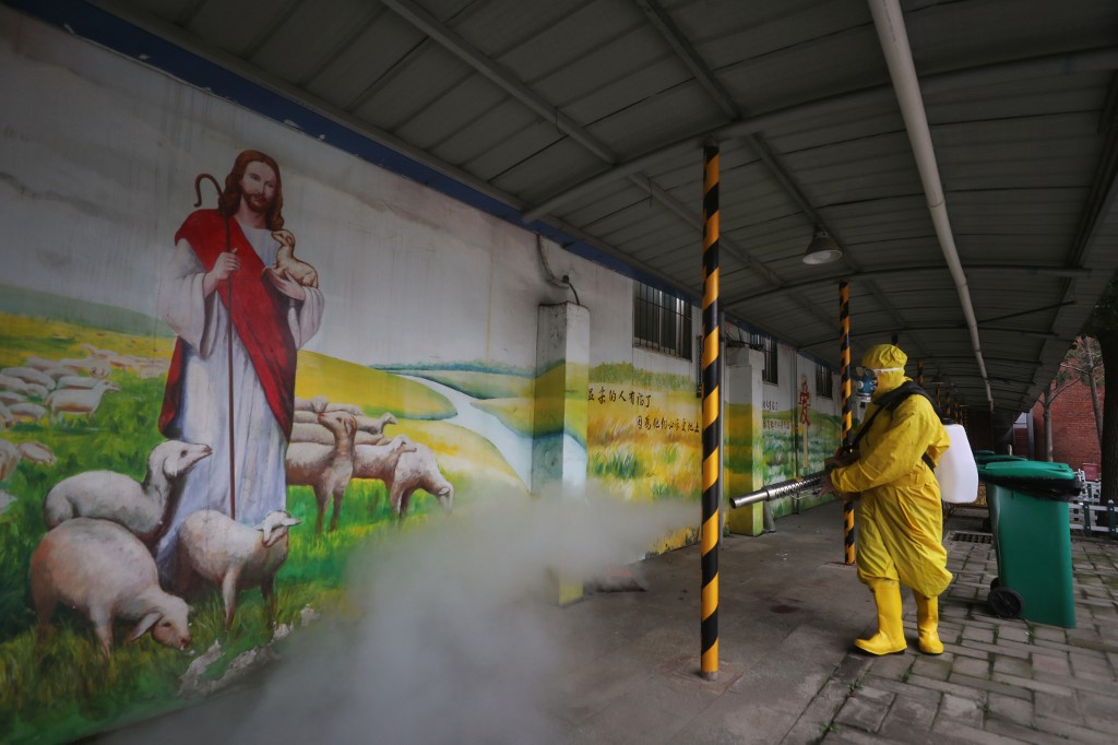 CHURCH. A worker disinfects the Hankou Salvation Church in Wuhan, in China's central Hubei province on March 6, 2020. Photo by STR/AFP 