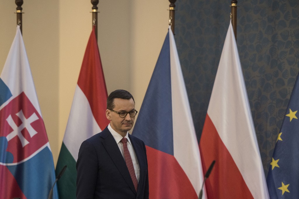 FIRST CASE. Poland's Prime Minister Mateusz Morawiecki gives a joint press conference with Slovakia's Prime Minister, Hungary's Prime Minister and Czech Republic's Prime Minister after a meeting of representatives of the Visegrad Group (V4), focusing on measures in response to the new coronavirus COVID-19, on March 4, 2020 in Prague. Photo by Michal Cizek/AFP 