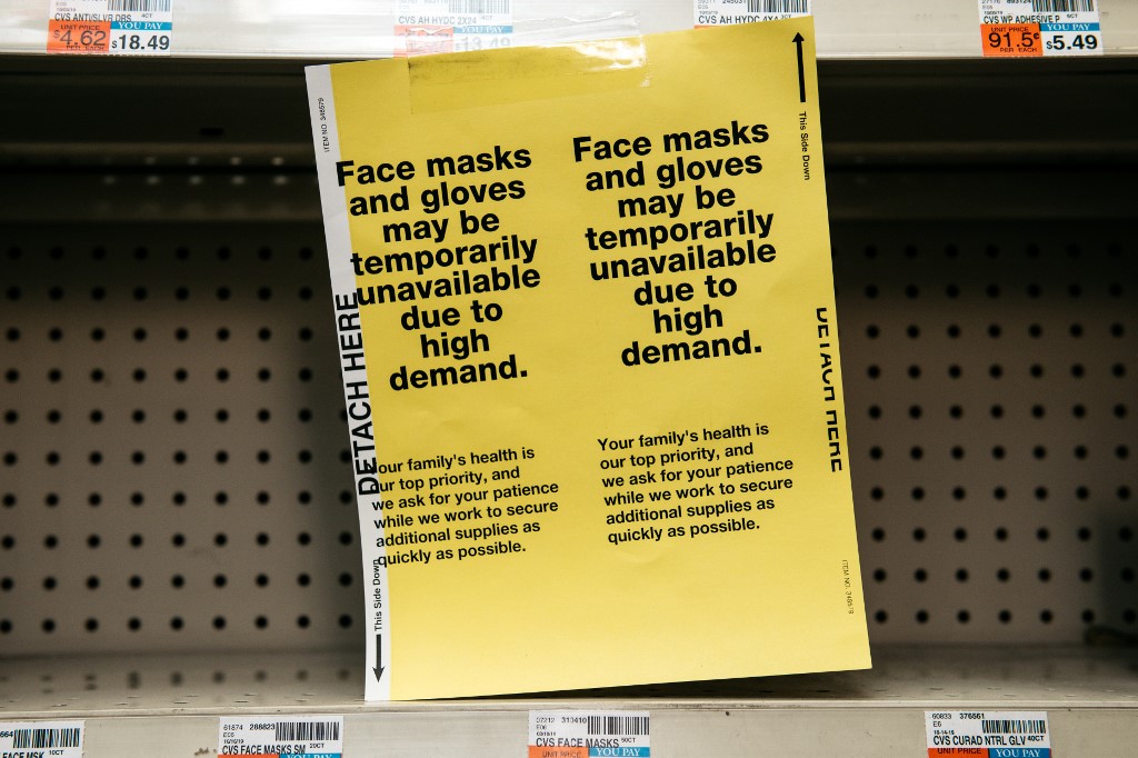 SOLD OUT. Amidst fears of a growing coronavirus pandemic, signs for sold out face masks are posted in a Manhattan pharmacy on February 26, 2020 in New York City. File photo by Scott Heins/Getty Images/AFP 