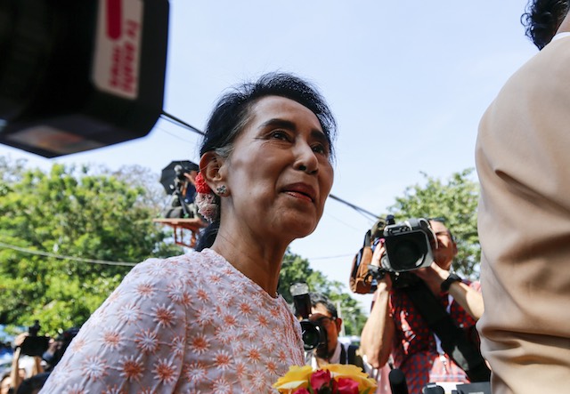Myanmar opposition leader Aung San Suu Kyi (C), chairperson of the National League for Democracy (NLD) party, arrives at the NLD headquarters to deliver a speech, in Yangon, Myanmar, November 9, 2015. Lynn Bo Bo/EPA 
