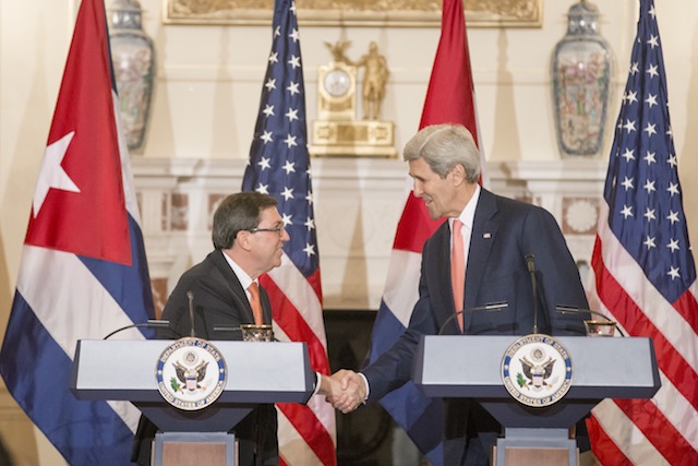 TIES RENEWED. US Secretary of State John Kerry (R) and Cuban Foreign Minister Bruno Rodriguez (L) shake hands at a news conference following their meeting at the State Department in Washington, DC, USA, July 20, 2015. Michael Reynolds/EPA 