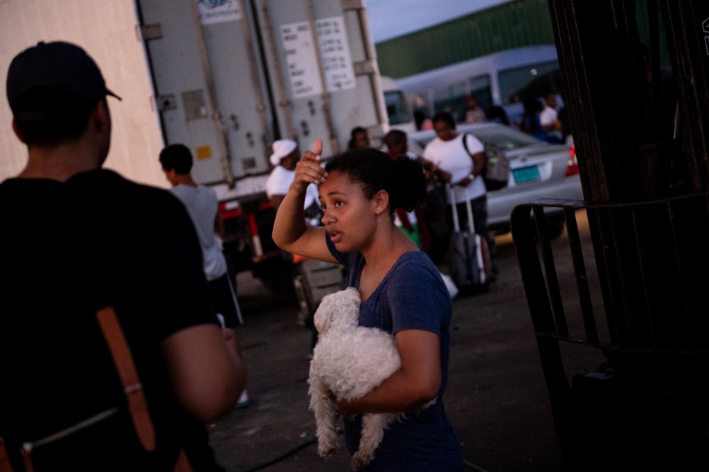 EVACUEES. Evacuees from Marsh Harbor arrive at Nassau's port on September 6, 2019, in Nassau, New Providence. Photo by Brendan Smialowski/AFP 