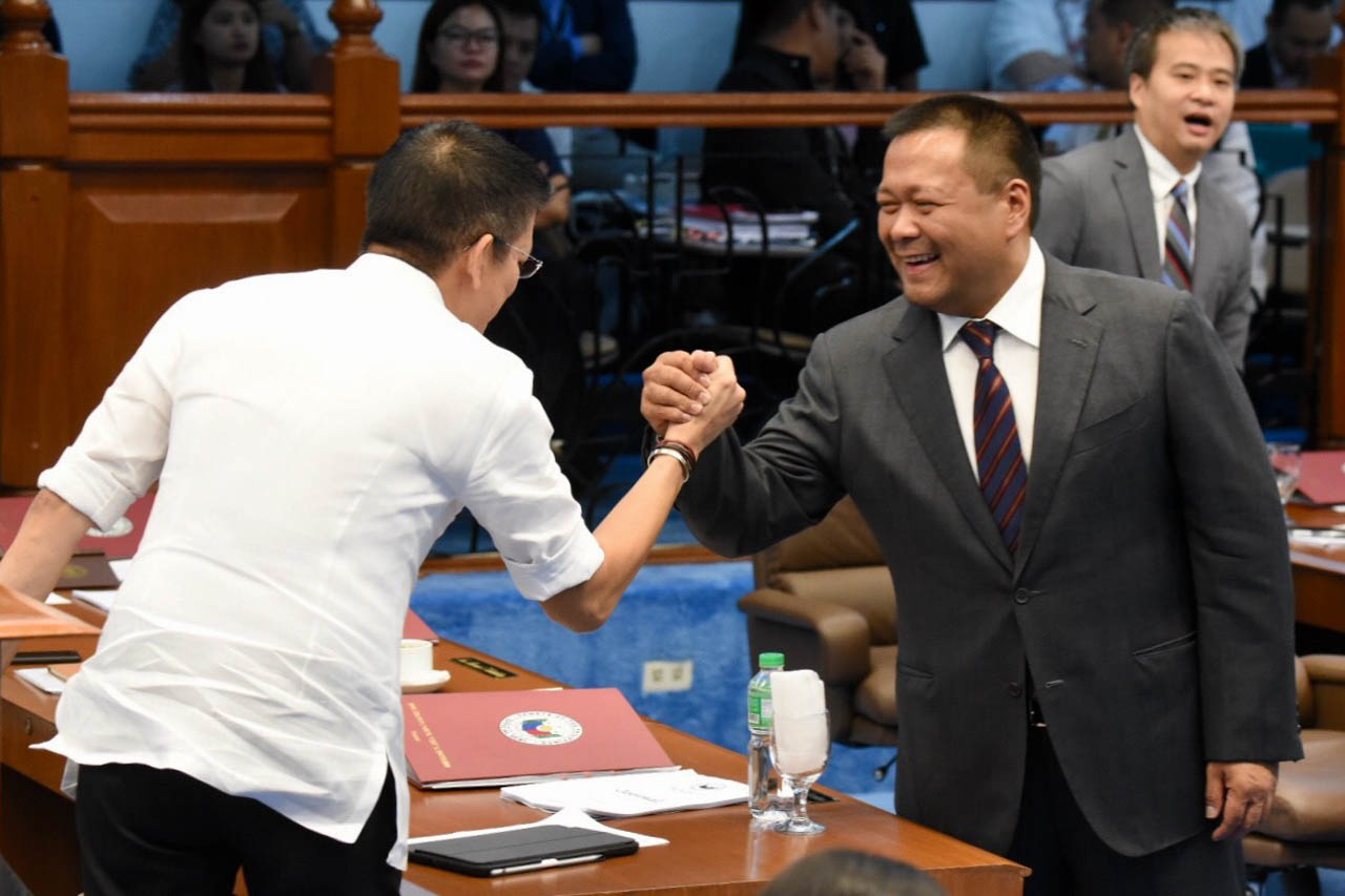 LEAVING THE SENATE. Outgoing senators JV Ejercito (right) and Francis Escudero greet each other on the last session day of the 17th Congress, June 4, 2019. All photos by Angie de Silva/Rappler  