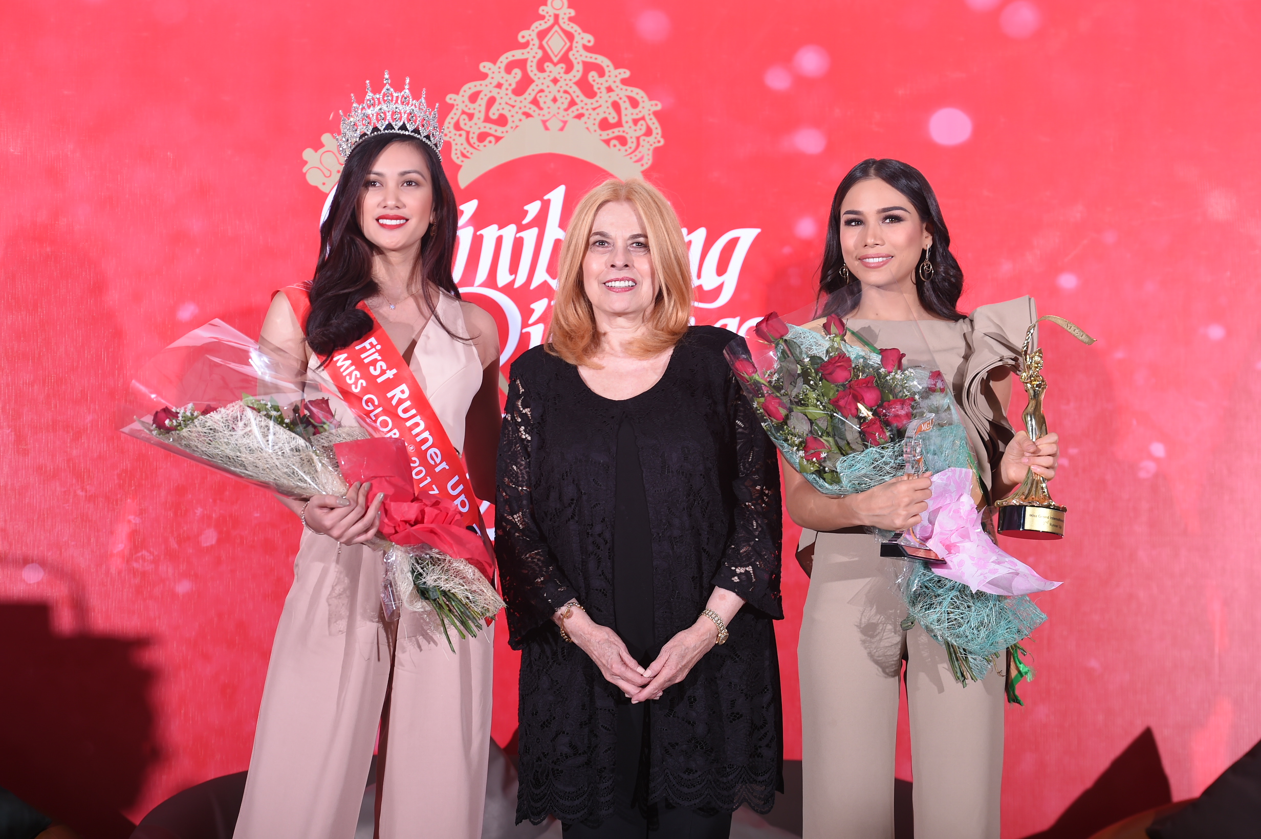 2017 PLACEMENTS.  Nelda Ibe, Miss Globe 2017 first runner up, and Elizabeth Clenci, Miss Grand International second runner up, are congratulated by Binibining Pilipinas Charities Inc. Chairwoman Madam Stella Marquez Araneta. Photo courtesy of Bb Pilipinas
 