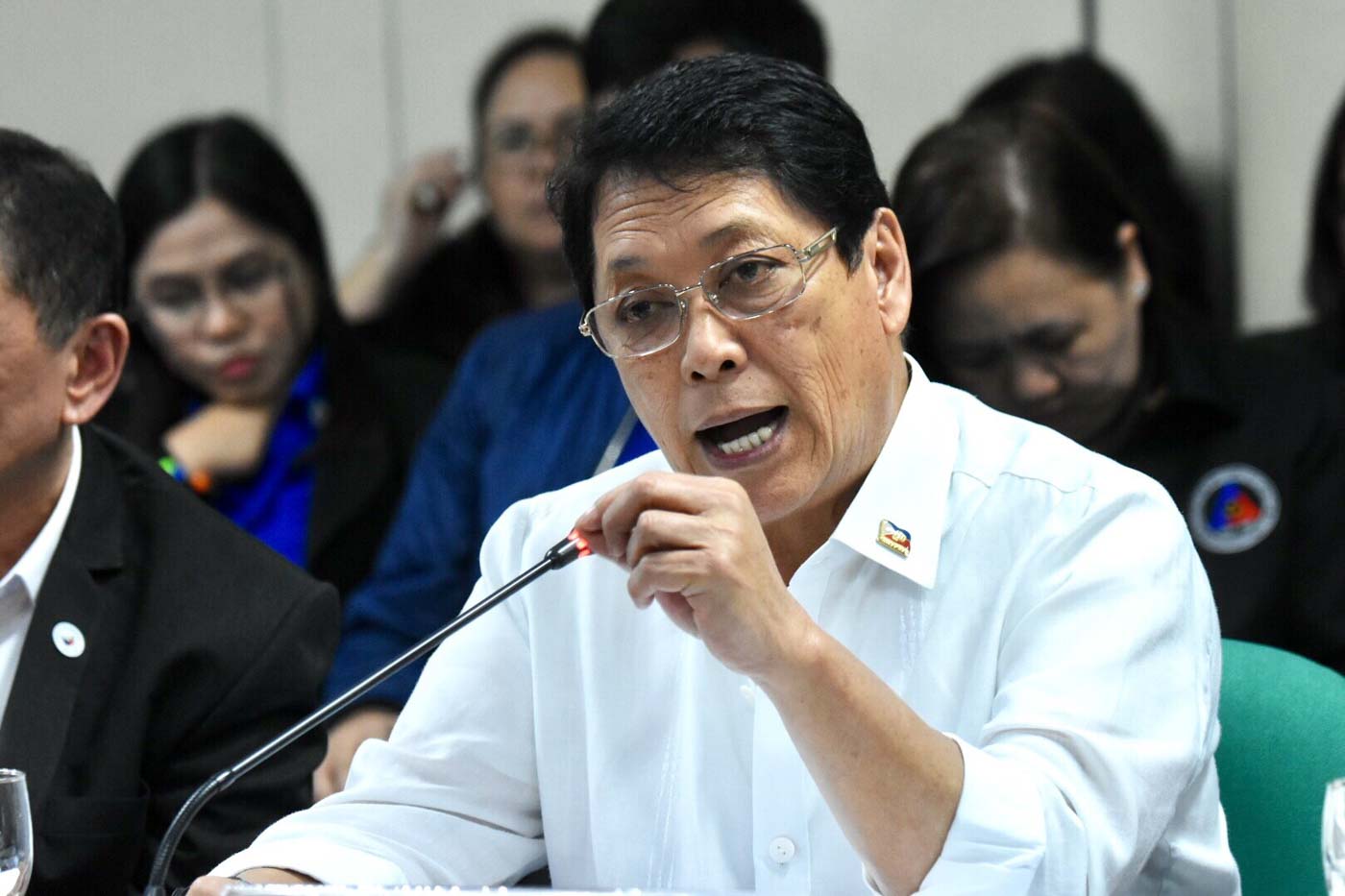 REPATRIATION. Labor Secretary Silvestre Bello III says Filipinos repatriated from the Middle East may be sent to other countries to work instead. File photo by Angie de Silva/Rappler 