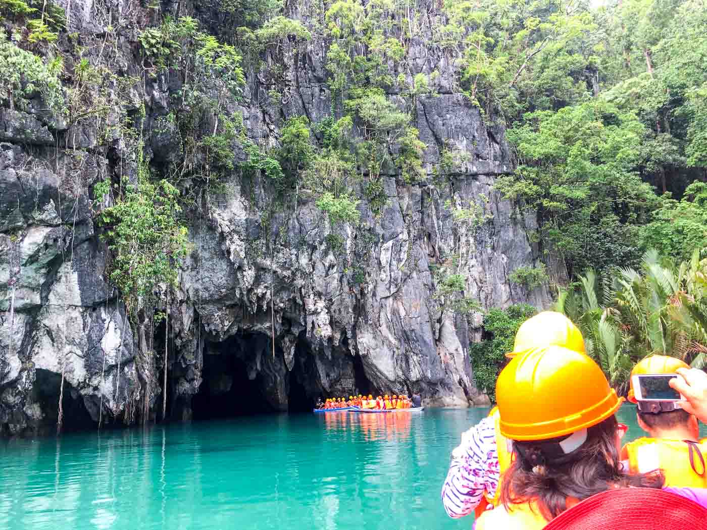 FAMOUS DESTINATION. Tourists aboard boats at the entrance of the Puerto Princesa Underground River. File photo by Mara Cepeda/Rappler 