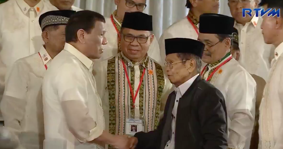 NEW CHAPTER. President Rodrigo Duterte shakes hands with new members of the Bangsamoro Transition Authority after their oath-taking ceremony in Malacañang. RTVM Screenshot 