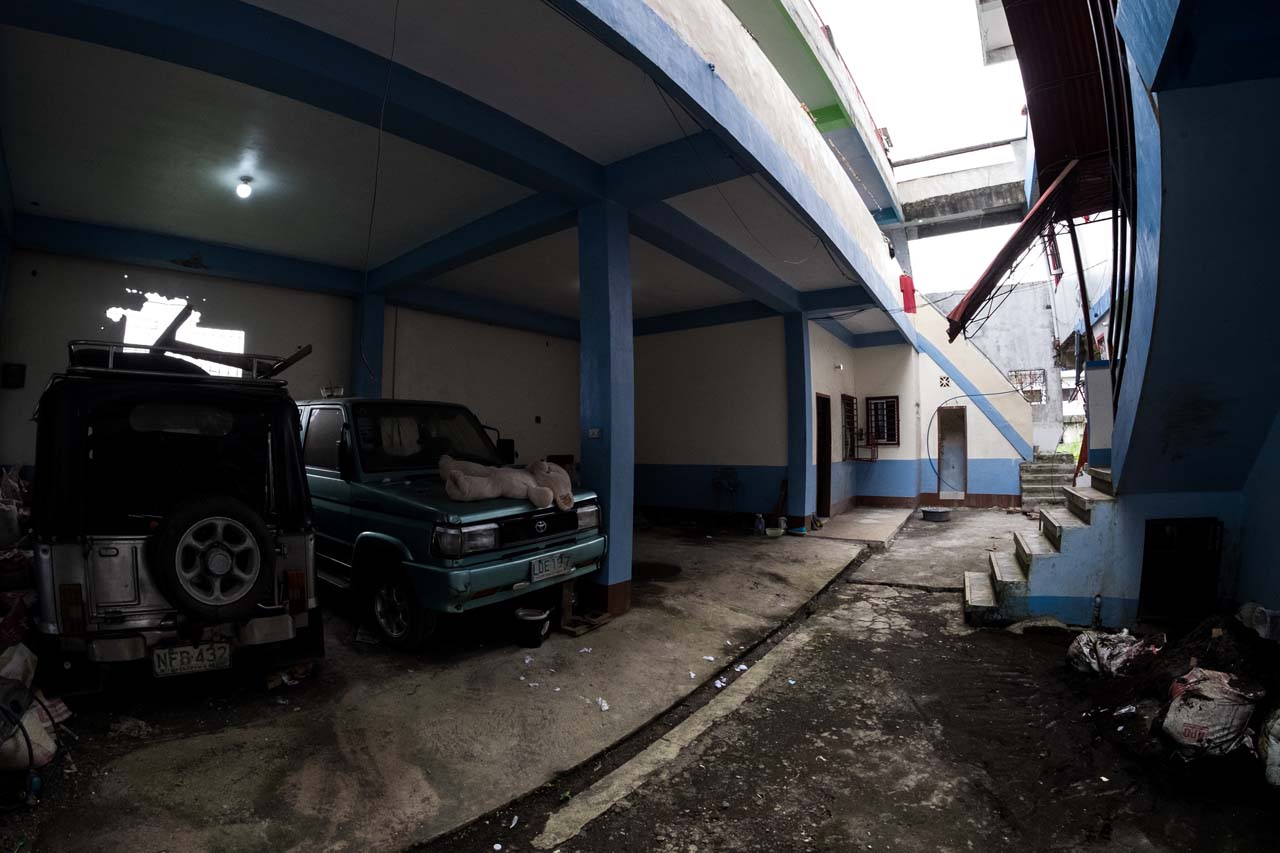 HELD HOSTAGE. The ground floor at the back side of the apartment where Isnilon Hapilon rented an apartment he used as his hideout and meeting place with other terrorists. At the far end is the room where 17 residents of the compound were padlocked by terrorists on May 23, 2017. Bobby Lagsa/Rappler   