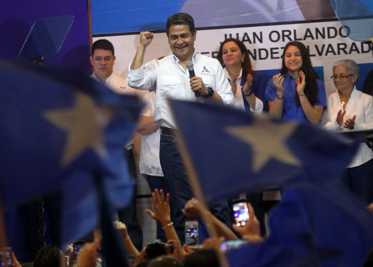 DECLARED WINNER. In this file photo, Honduran President Juan Orlando Hernandez addresses supporters following victory in the primary elections of the National Party in Tegucigalpa, March 12, 2017. Stringer/AFP 