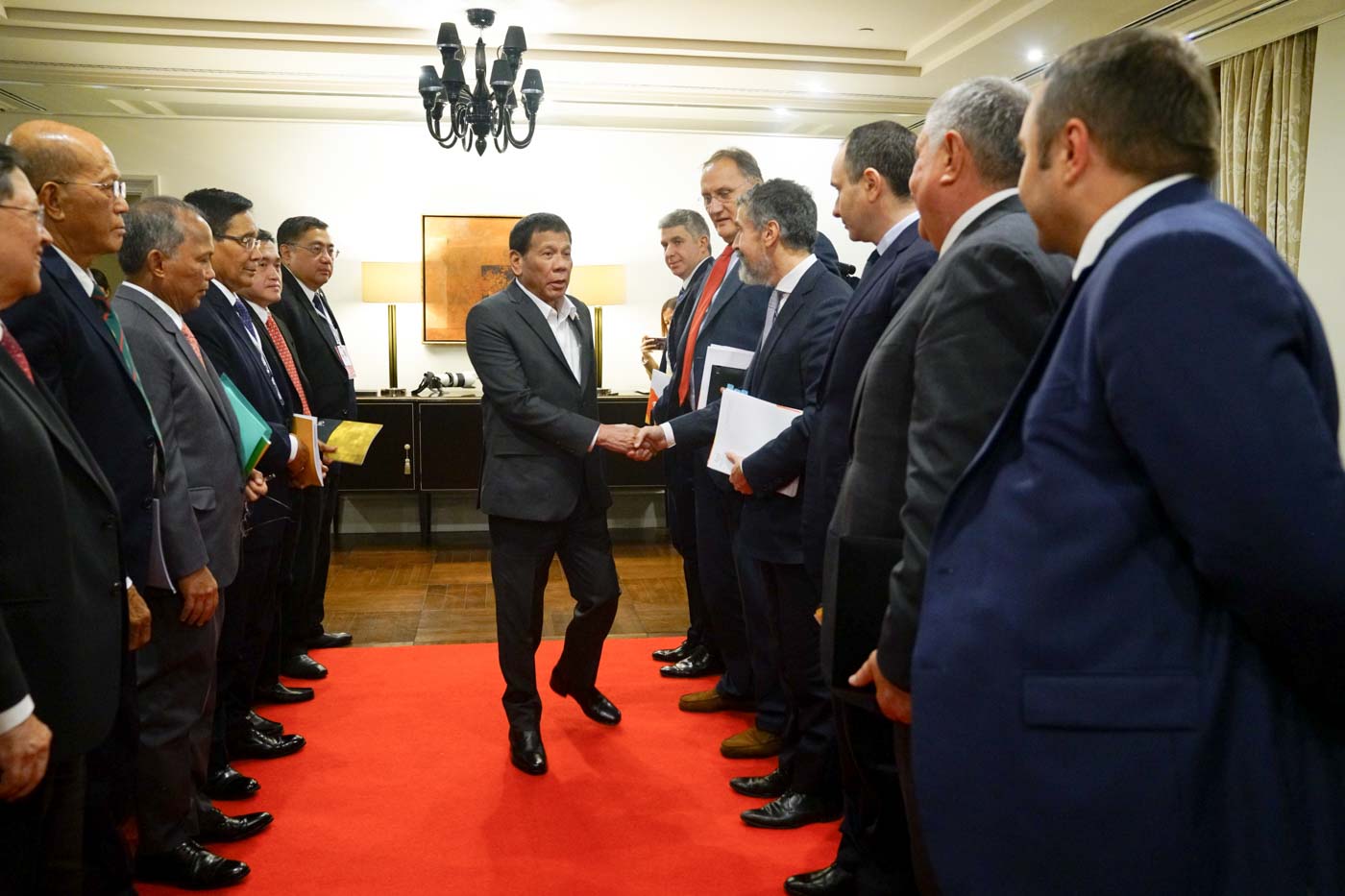 AN INVITATION. President Rodrigo Duterte greets the officials of Rosneft Oil Co led by its CEO Igor Sechin on October 2, 2019. Malacañang photo 