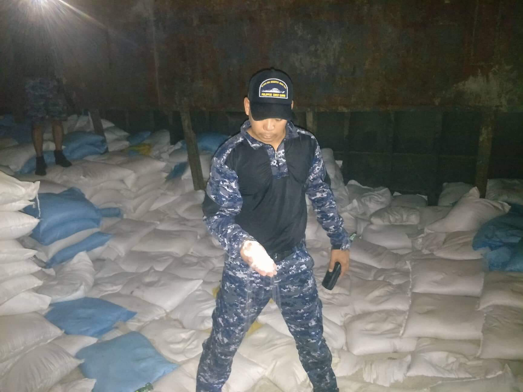 SMUGGLED RICE. The Philippine Coast Guard finds a ship loaded with allegedly smuggled rice in Tonquil, Sulu. Photo courtesy of PCG Southern Mindanao  
