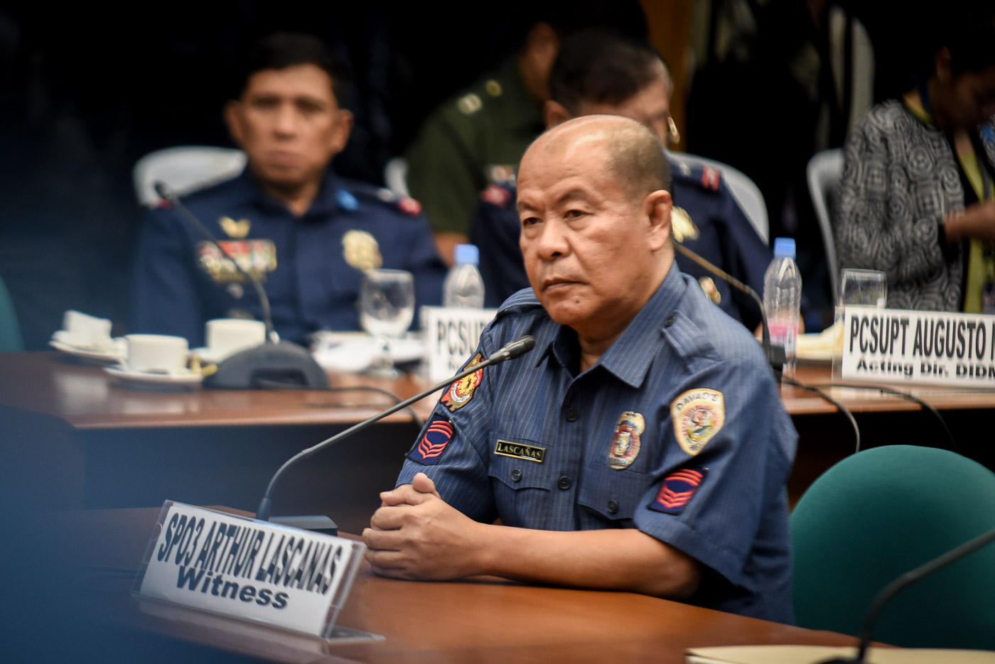 I PROMISED GOD I WILL MAKE A PUBLIC CONFESSION. In this file photo taken at a Senate hearing in October 2016, then SPO3 Arturo Lascañas denies the existence of the Davao Death Squad.   