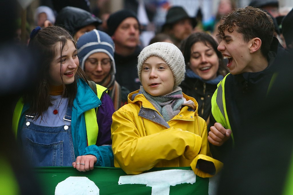 THUNBERG. Swedish climate activist Greta Thunberg (C) takes part in a "Youth Strike 4 Climate" protest march in Bristol, south west England on February 28, 2020. Photo by Geoff Caddick/AFP 