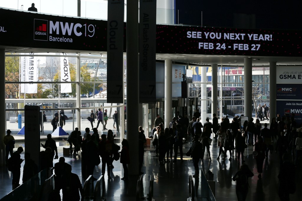 CANCELED. Visitors leave the Mobile World Congress (MWC) venue in Barcelona on February 28, 2019, the last day of the fair. File photo by Pau Barrena/AFP 