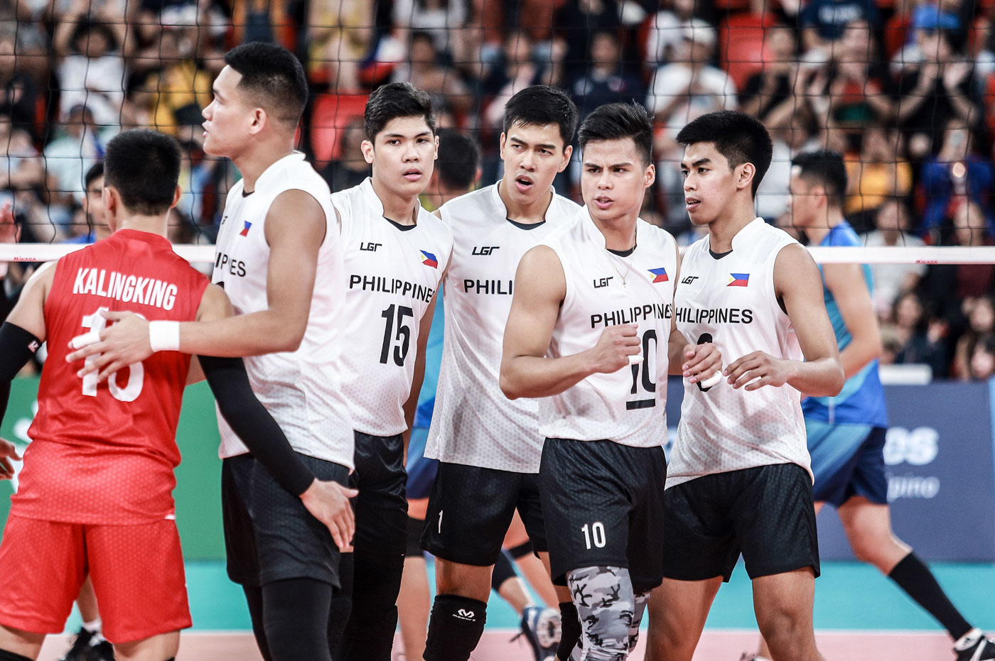 OVERACHIEVERS. The Filipino spikers pull off a SEA Games surprise. Photo by Michael Gatpandan/Rappler 