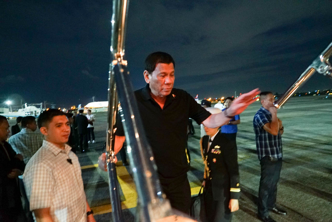 CHINA-BOUND. President Rodrigo Duterte boards a plane bound for the People's Republic of China at the Villamor Air Base in Pasay City on August 28, 2019. Photo by King Rodriguez/Presidential photo 