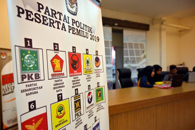 INDONESIAN POLITICS. This picture shows a banner featuring many of the political parties campaigning in the upcoming election, at the offices of the General Elections Commission (KPU) in Jakarta on January 31, 2019. Photo by Adek Berry/AFP 