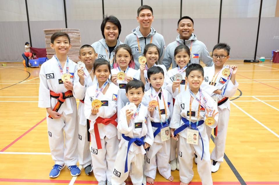 WINNING TEAM.The winning Philippine team with their coaches, led by Olympian Donnie Geisler (center). Photo from Donnie Geisler Taekwondo Training Center Facebook page   